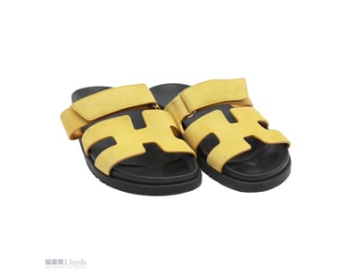 HERMES YELLOW SUEDE CHYPRE SANDALS SIZE 38.5

Mate...