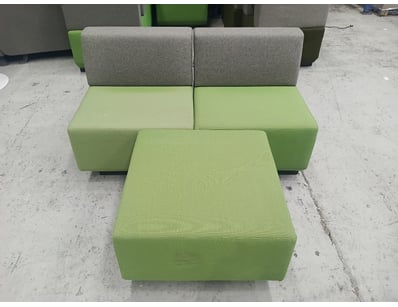 Modern modular seating system featuring a two-seat...