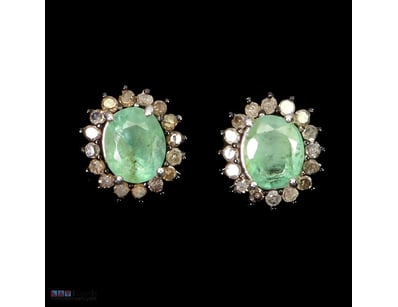 NATURAL DIAMOND & EMERALD STUD EARRINGS.      

Na...