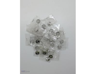 COLLECTION OF FOOTPRINTS SILVER COLOURED CHARMS

T...