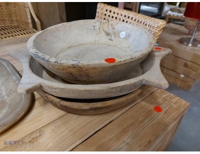 Set of three hand-carved wooden bowls. The bowls f...