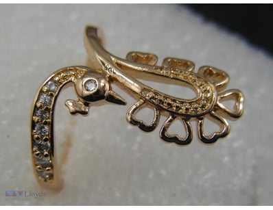 GOLD COLOUR RING SIZE 7        

Condition: Good -...