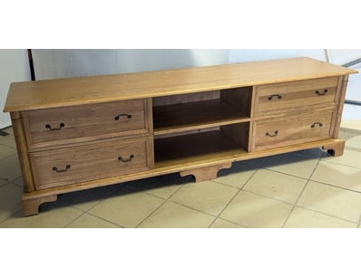 Solid oak entertainment unit featuring a spacious ...