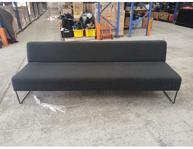 Modern minimalist bench featuring a charcoal grey ...