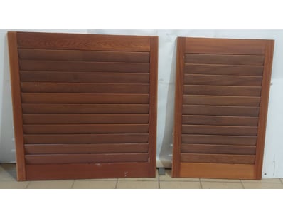 Lot of two wooden louvre/shutter panels featuring ...
