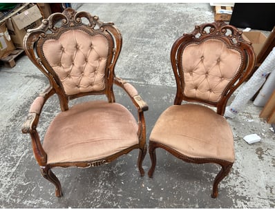Pair of ornate Victorian-style dining chairs featu...