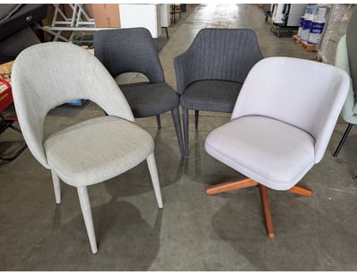 Lot of four contemporary dining chairs featuring m...