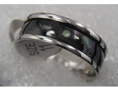 STAINLESS STEEL RING SIZE 11        

Condition: G...