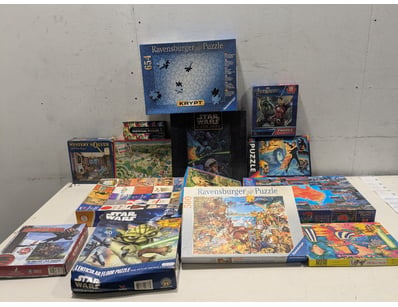 Extensive puzzle collection comprising approximate...