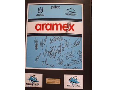 CRONULLA SHARKS 2026 SQUAD SIGNED/FRAMED JERSEY

C...