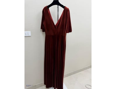BURGUNDY VELVET EVENING GOWN WITH FLUTTER SLEEVES
...