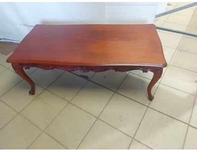 Timber coffee table with curved legs.

Dimensions:...