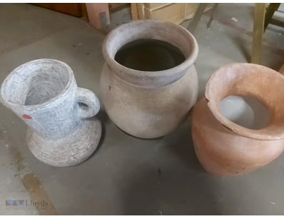 Handcrafted ceramic vessel collection comprising t...
