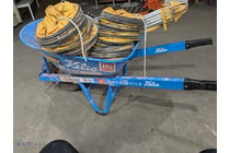 Kelso brand wheelbarrow loaded with construction