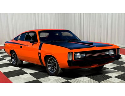 <b>1975 Chrysler Valiant VK Coupe - Orange and Bla...