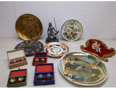 Eclectic decorative collection featuring collectib...