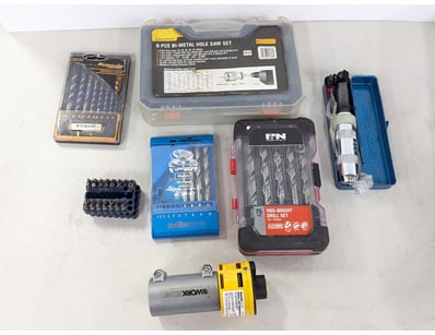 Vollection of toolset items including drill bit se...