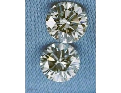 0.10 CARAT BROWN 2 ROUND DIAMOND         

Conditi...