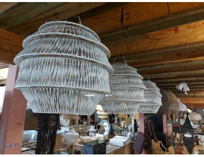 Set of three white woven pendant light fixtures fe...