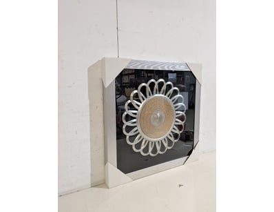 Contemporary decorative wall art piece featuring a...
