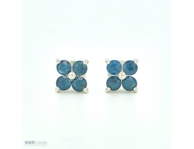 9CT WHITE GOLD CEYLON SAPPHIRE FLORAL STUD EARRING...