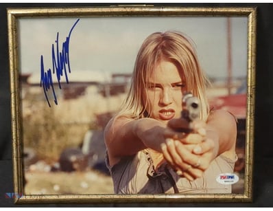 AN AUTOGRAPHED PHOTO OF ACTRESS RENÉE ZELLWEGER.

...
