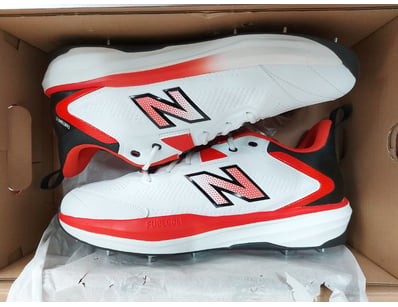 New Balance CK4030F6 cricket shoes in white with r...