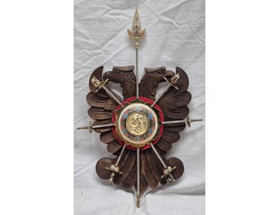 ORNATE WOODEN HERALDI WITH ENAMELED CENTRAL MEDALL...