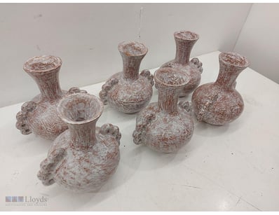 A striking collection of six 27cmH x 18cmW decorat...