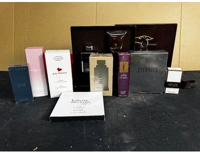 Scents, assorted variety of perfumes and colognes,...