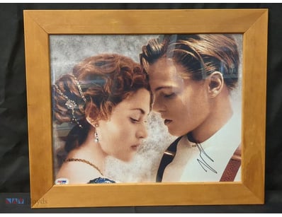 AUTOGRAPHED PHOTOGRAPH OF KATE WINSLET AND LEONARD...