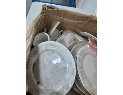 Box of assorted tableware and spatula.

SOLD AS LO...