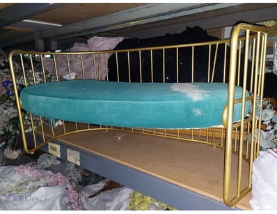 Vintage like brass-finished meta bed frame featuri...