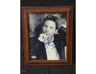 A HAND-SIGNED PHOTOGRAPH OF AMERICAN ACTOR STEPHEN...