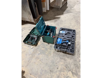 Assorted lot of power tools featuring three cases....