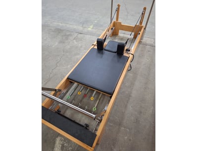 Pilates Master reformer in natural timber style wi...