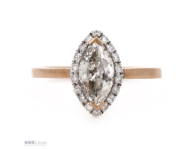14K ROSE GOLD AND DIAMOND, HALO RING.      

The C...