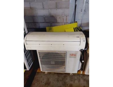 Fujitsu split-system air conditioning unit compris...