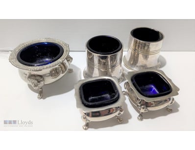 ASSORTED SILVER PLATED SALTS WITH COBALT BLUE GLAS...