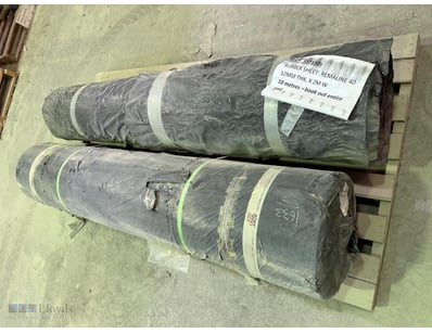 Lot comprising two rolls of sheet material in seal...