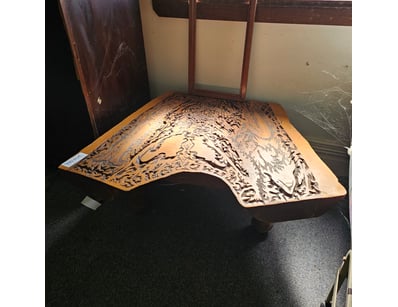 Wooden coffee table with engraved pattern

Sold as...