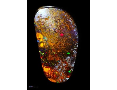50 CARATS WINTON BOULDER OPAL. LOTS OF REDS GREENS...