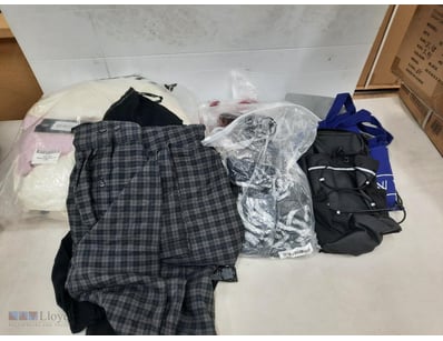 Assorted Lot of clothing and bags.

SOLD AS LOT.
...