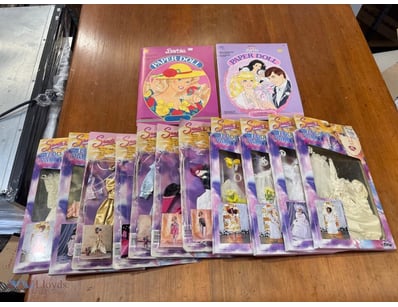 Vintage Barbie Paper Doll collection comprising tw...