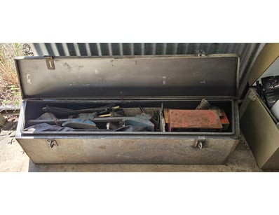 Toolbox with assorted tools, including clamp, wren...