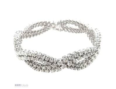 18CT WHITE GOLD (XRF TESTED) DIAMOND BRACELET

Fea...