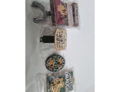 Collection of four beer pump clips and related bre...
