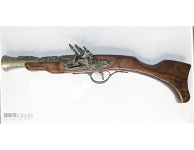 ORNATE FLINTLOCK MUSKET WITH BRASS FITTINGS AND CA...