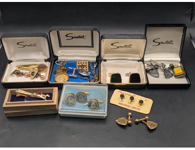 Suit accessories, including stamped cufflinks, tie...
