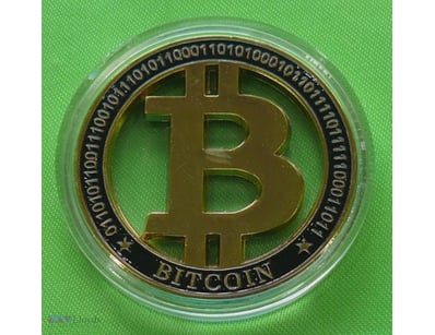 HOLLOW BITCOIN TOKEN IN PROTECTIVE CAPSULE.  



1...